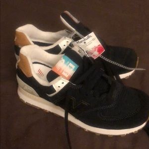 Size 6.5 New Balance sneakers.  Never worn!!